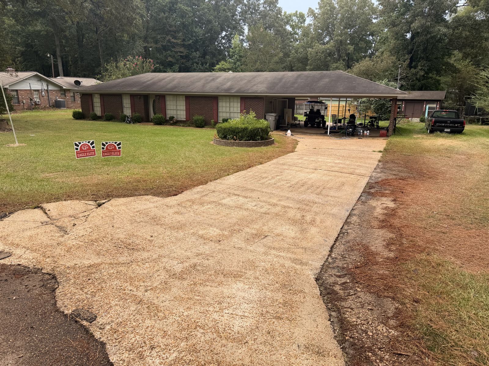 Clean driveway after pressure washing